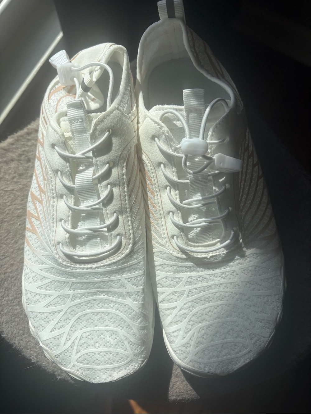 Women’s White Athletic Slip-On Sneakers with Pull Toggle